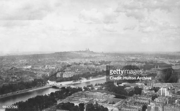 View of Paris from the Eiffel Tower towards the hill of Montmartre and the Sacre Coeur and with the Grand Palais at centre, right, circa 1910.