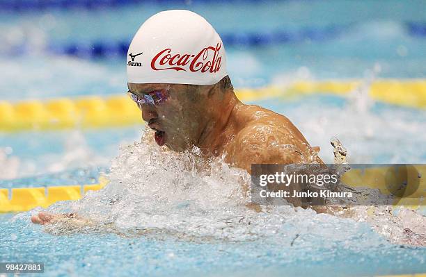 Kosuke Kitajima competes in the Men's 50 Breaststroke Final during day one of the Japan Swim 2010 at Tokyo Tatsumi International Swimming Pool on...