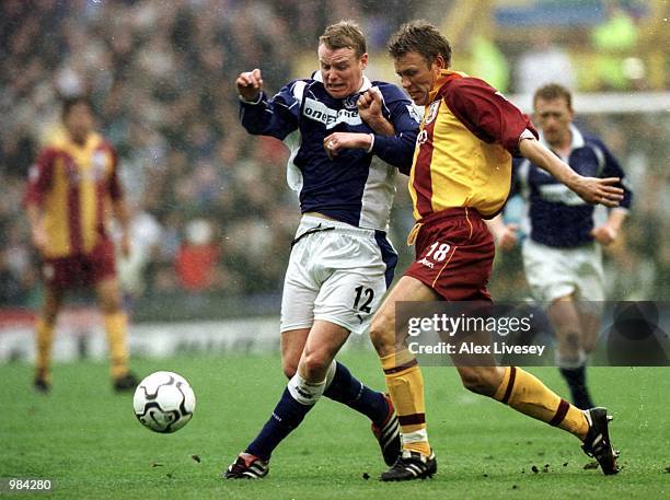 Gunnar Halle of Bradford challenges Michael Ball of Everton during the FA Premier League game between Everton v Bradford City at Goodison Park,...