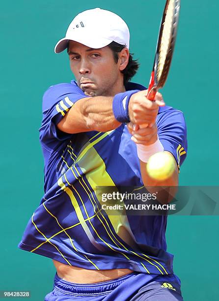 Spanish Fernando Verdasco hits a return to his French opponent Julien Benneteau during the Monte-Carlo ATP Masters Series Tournament tennis match, on...