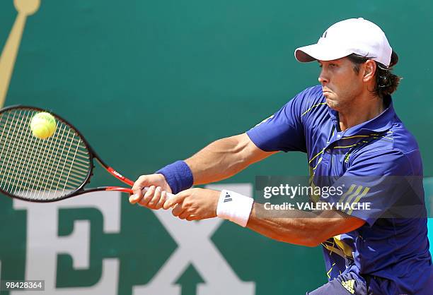 Spanish Fernando Verdasco hits a return to his French opponent Julien Benneteau during the Monte-Carlo ATP Masters Series Tournament tennis match, on...