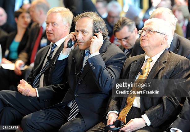 President Michel Platini sits between Theo Zwanziger , president of the German Football Association and Ole Von Beust, mayor of Hamburg during the...