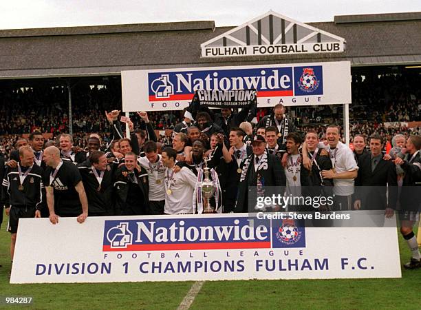 Fulham celebrate with the Division One trophy after the Nationwide Division One match between Fulham and Wimbledon at Craven Cottage, London....