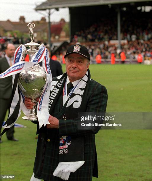 Mohamed Al Fayed, Chairman of Fulham, stands with the Division One Trophy after the Nationwide Division One match between Fulham and Wimbledon at...