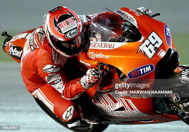 Ducati Marlboro Team's Nicky Hayden of the US races during the 2010 MotoGP free practice at the Losail International Circuit in Doha on April 10,...