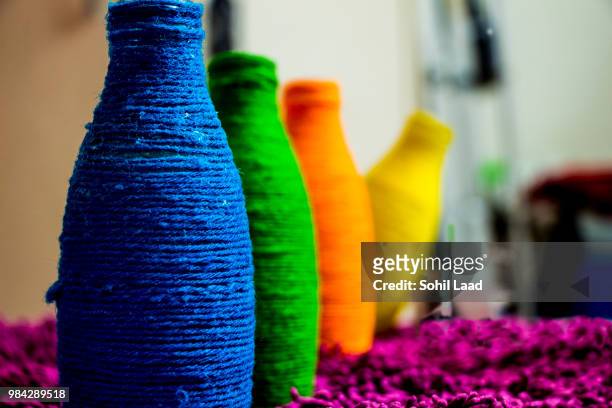 bottle with colors of love - spectrum 2014 inside stock-fotos und bilder