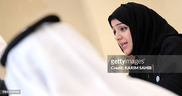 Reem al-Hashemi, UAE State Minister for International Cooperation, speaks during a press briefing in the capital Abu Dhabi on June 26 about the...