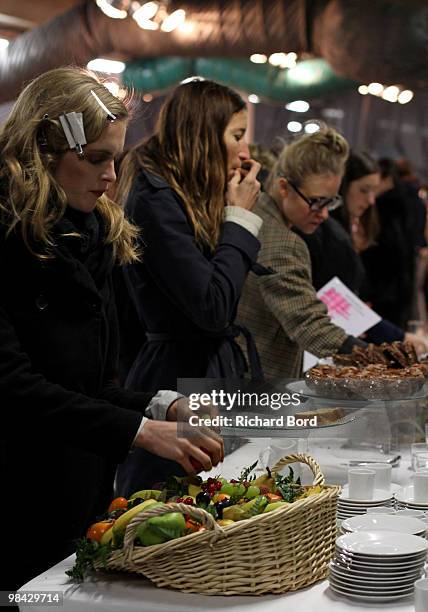 Models eat backstage before the Sonia Rykiel Ready to Wear show as part of the Paris Womenswear Fashion Week Fall/Winter 2011 at Halle Freyssinet on...