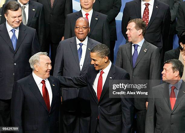 President Barack Obama greets President of Kazakhstan Nursultan Nazarbayev as King Abdullah II of Jordan, and upper row , President of Ukraine Viktor...