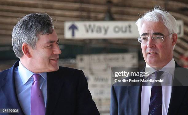 Chancellor of the Exchequer Alistair Darling and Prime Minister Gordon Brown walk to a train on April 13, 2010 in Nottingham, England.The General...