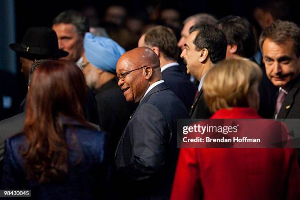 President Jacob Zuma of South Africa leaves the room after participating in a group photo with world leaders and heads of delegations at the Nuclear...