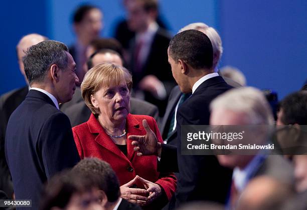 Lee Hsien Loong , Prime Minister of the Republic of Singapore, Dr. Angela Merkel , Chancellor of the Federal Republic of Germany, and U.S. President...