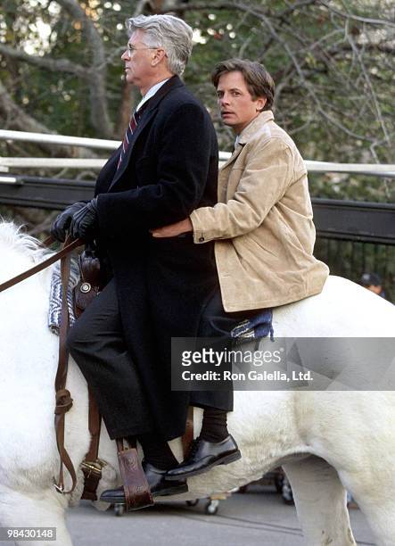 Actor Barry Bostwick and actor Michael J. Fox on November 19, 1997 taping "Spin City" at Century Park in New York City.