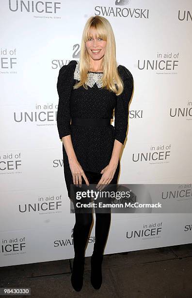 Claudia Schiffer attends a photocall to switch on Swarovski's five metre Crystal Snowflake designed by Ingo Maurer at Mandarin Oriental Hyde Park on...