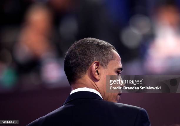 President Barack Obama waits before a plenary session at the Washington Convention Center April 13, 2010 in Washington, DC. Delegates from...