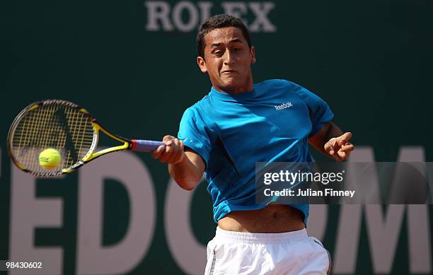 Nicolas Almagro of Spain plays a forehand in his match against Jo-Wilfried Tsonga of France during day two of the ATP Masters Series at the Monte...