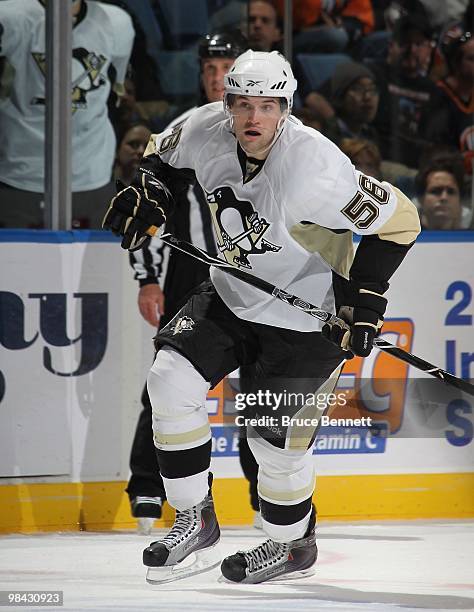 Eric Tangradi of the Pittsburgh Penguins skates in his first NHL game against the New York Islanders at the Nassau Coliseum on April 11, 2010 in...