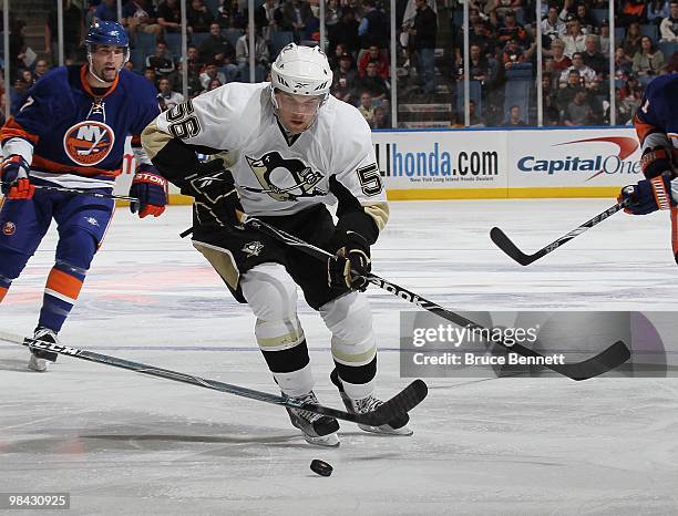 Eric Tangradi of the Pittsburgh Penguins skates in his first NHL game against the New York Islanders at the Nassau Coliseum on April 11, 2010 in...