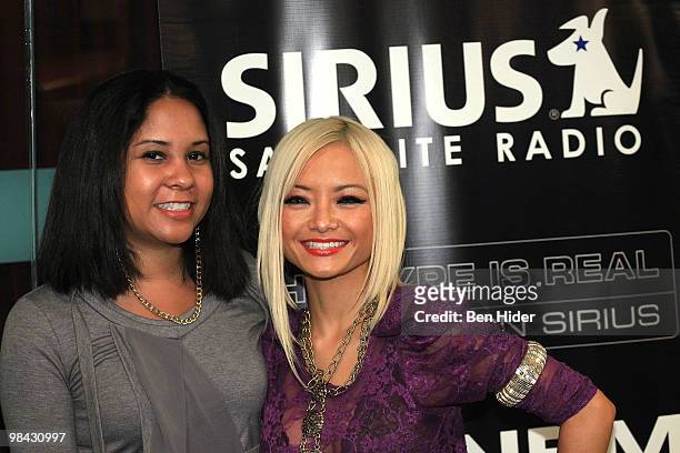Sirius XM Radio Host Angela Yee and TV Personality Tila Tequila visits the SIRIUS XM Studio on April 13, 2010 in New York City.