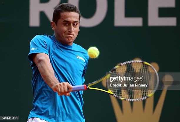 Nicolas Almagro of Spain plays a backhand in his match against Jo-Wilfried Tsonga of France during day two of the ATP Masters Series at the Monte...