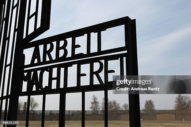 Gate marked with the inscription 'Arbeit Macht Frei' is pictured at the former concentration camp Sachsenhausen on April 13, 2010 in Oranienburg,...