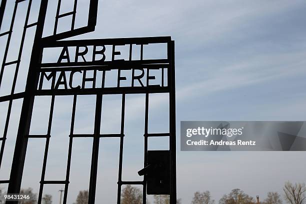 Gate marked with the inscription 'Arbeit Macht Frei' is pictured at the former concentration camp Sachsenhausen on April 13, 2010 in Oranienburg,...