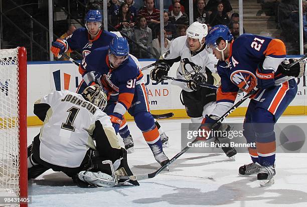 Matt Moulson, John Tavares, Kyle Okposo of the New York Islanders skate against the Pittsburgh Penguins at the Nassau Coliseum on April 11, 2010 in...