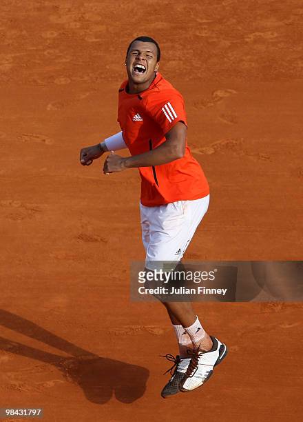 Jo-Wilfried Tsonga of France celebrates at match point against Nicolas Almagro of Spain during day two of the ATP Masters Series at the Monte Carlo...