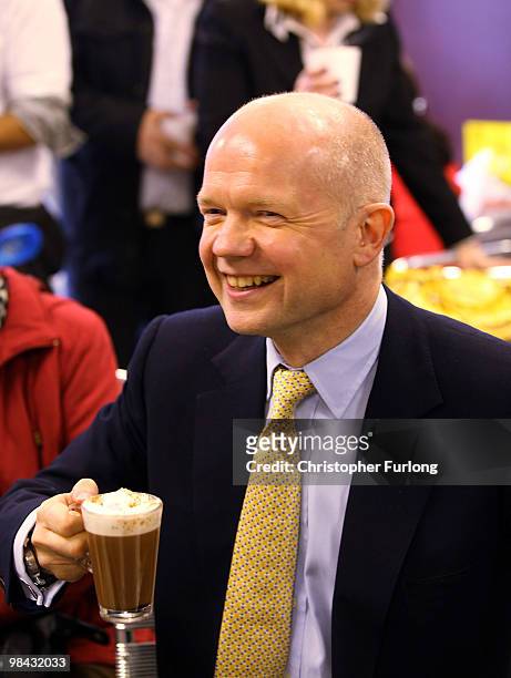 Conservative shadow foreign secretary William Hague enjoys a hot chocolate in the Cosy Cafe and meets members of the public after launching the Tory...