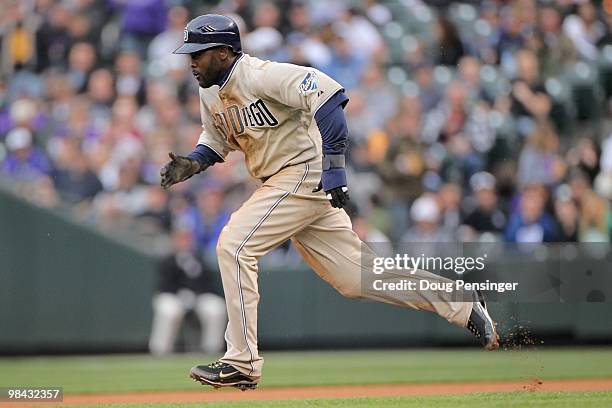 Centerfielder Tony Gwynn Jr. #18 of the San Diego Padres steals secondbase against starting pitcher Jason Hammel of the Colorado Rockies during MLB...