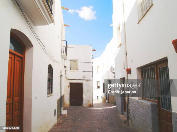 street of the tourist town of mojacar. almeria - flower pot island stock pictures, royalty-free photos & images