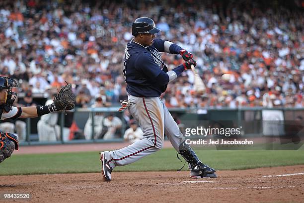 Yunel Escobar of the Atlanta Braves bats against the San Francisco Giants on Opening Day at AT&T Park on April 9, 2010 in San Francisco, California.