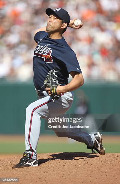 Takashi Saito of the Atlanta Braves pitches against the San Francisco Giants on Opening Day at AT&T Park on April 9, 2010 in San Francisco,...