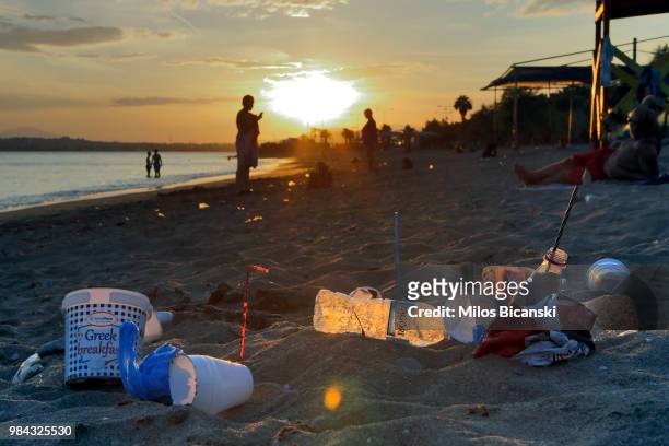 Plastic cups used by tourists on the Aegean sea beach near Athens on June 26 Greece . The Mediterranean is one of the seas with the highest levels of...