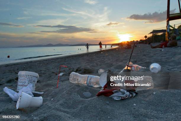 Plastic cups used by tourists on the Aegean sea beach near Athens on June 26 Greece . The Mediterranean is one of the seas with the highest levels of...