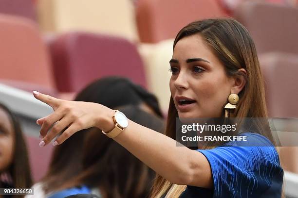 France's forward Florian Thauvin's girlfriend Charlotte Pirroni arrives to attend the Russia 2018 World Cup Group C football match between Denmark...