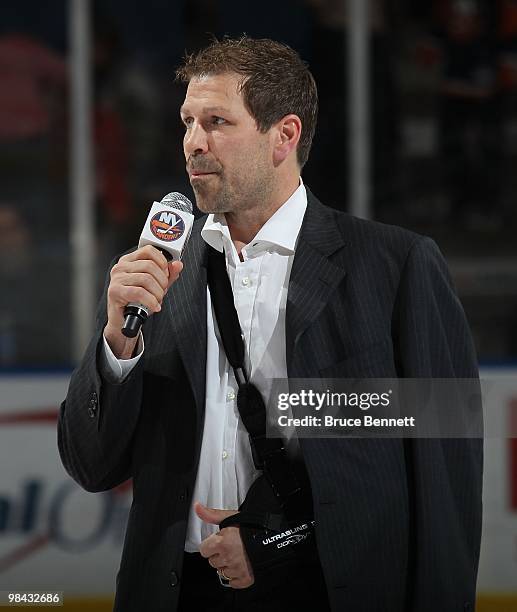 Doug Weight of the New York Islanders addresses the fans following the Islanders final game of the season against the Pittsburgh Penguins at the...