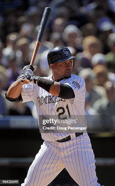 Catcher Miguel Olivo of the Colorado Rockies takes an at bat against the San Diego Padres during MLB action on Opening Day at Coors Field on April 9,...