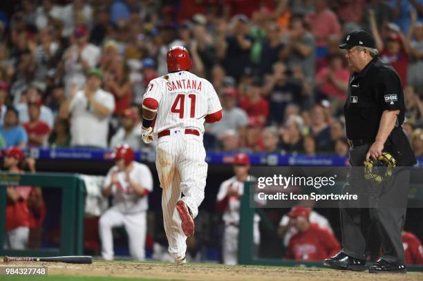 Philadelphia Phillies First base Carlos Santana scores a run during a Major League Baseball game between the New York Yankees and the Philadelphia...