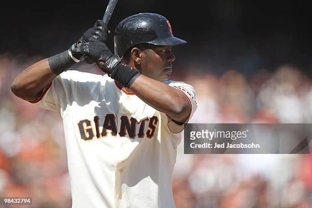 Edgar Renteria of the San Francisco Giants bats against the Atlanta Braves on Opening Day at AT&T Park on April 9, 2010 in San Francisco, California.