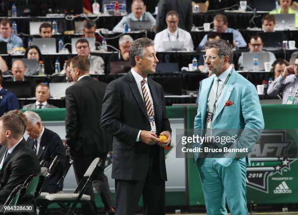 Doug Wilson and Marc Bergevin attend the 2018 NHL Draft at American Airlines Center on June 23, 2018 in Dallas, Texas.