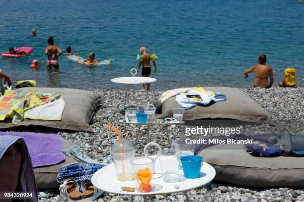 Plastic cups used by tourists on the Aegean sea beach near Athens on June 26 Greece . The Mediterranean is one of the seas with the highest levels of...