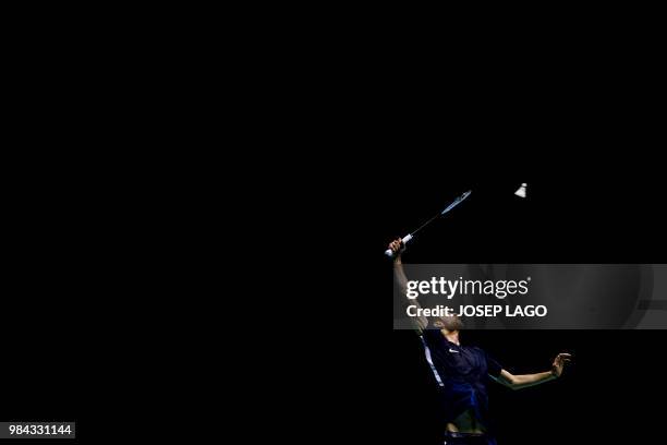 French Lucas Maurice Corvee returns to Spanish Pablo Abian during their badminton Men's Singles Finals - Gold Medal Match at the XVIII Mediterranean...