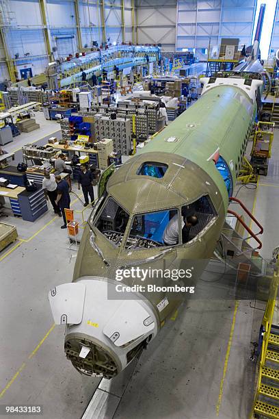 Bombardier Q400 NextGen turboprop airliner sits in construction, in one of the hangars at the Bombardier Aerospace plant at Downsview airport, in...