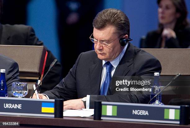 Viktor Yanukovych, Ukraine's president, attends the opening plenary of the Nuclear Security Summit with U.S. President Barack Obama at the Washington...
