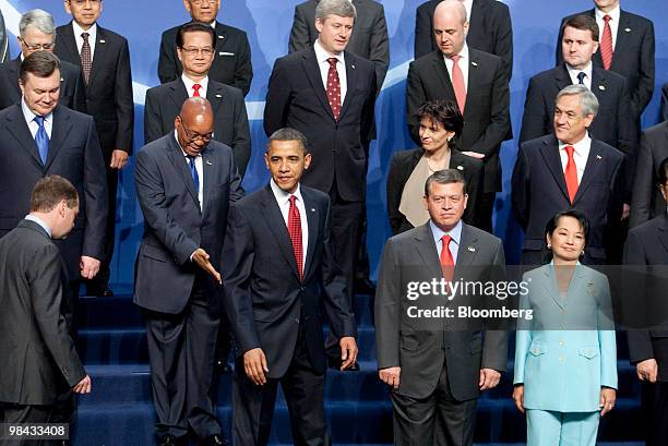 President Barack Obama arrives for a group photo with the heads of delegations attending the Nuclear Security Summit at the Washington Convention...