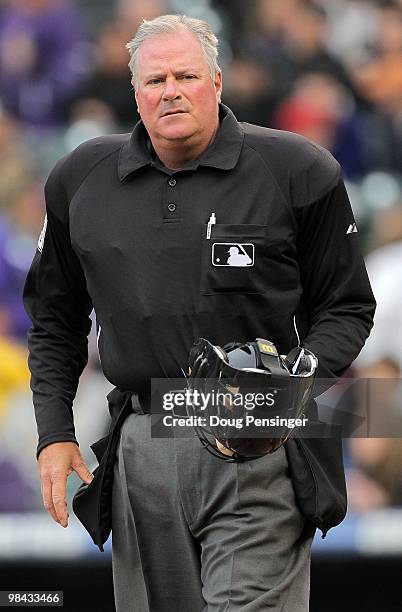 Homeplate umpire and crewchief Tim Welke oversees the action between the San Diego Padres and the Colorado Rockies during MLB action at Coors Field...