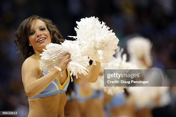 Members of the Denver Nuggets Dance Team perform as the Nuggets host the Los Angeles Lakers during NBA action at the Pepsi Center on April 8, 2010 in...