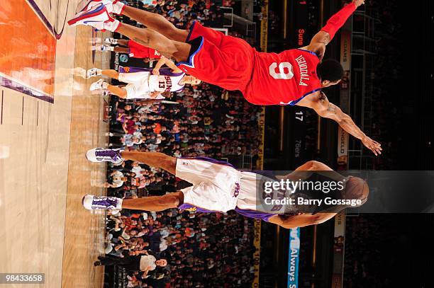 Grant Hill of the Phoenix Suns goes up for a shot over Andre Iguodala of the Philadelphia 76ers during the game on February 24, 2010 at US Airways...