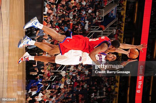 Channing Frye of the Phoenix Suns shoots over Thaddeus Young of the Philadelphia 76ers during the game on February 24, 2010 at US Airways Center in...